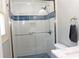 Glass enclosed shower with tile surround at 199 Candy Ln, Canton, GA 30115