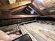Attic space displaying wooden beam construction and insulation at 2413 N. Decatur Rd, Decatur, GA 30033