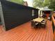 Expansive wooden deck perfect for dining, relaxing, and entertaining with a pergola at 2413 N. Decatur Rd, Decatur, GA 30033