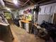 Unfinished basement area with a workbench and tool storage at 2413 N. Decatur Rd, Decatur, GA 30033