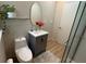 Updated bathroom featuring a modern vanity, sleek fixtures, and a glass-enclosed shower with neutral tile at 2413 N. Decatur Rd, Decatur, GA 30033