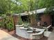 Landscaped front yard with beautiful plantings and hardscape elements with a home address at 2413 N. Decatur Rd, Decatur, GA 30033