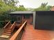 Backyard with deck and stairs leading to the patio, offering scenic views and outdoor living at 2413 N. Decatur Rd, Decatur, GA 30033