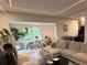 Open-concept living room with dining area, offering plenty of natural light and a comfortable seating arrangement at 2413 N. Decatur Rd, Decatur, GA 30033
