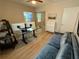 Bright home office with a glass desk, dual monitors, comfortable seating, and plenty of natural light at 2413 N. Decatur Rd, Decatur, GA 30033