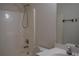 Bathroom featuring a shower/tub combo with white tiling and a vanity sink at 2955 Briaroak Dr, Duluth, GA 30096