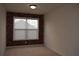 Bedroom featuring brick accent wall with window and neutral carpet at 2955 Briaroak Dr, Duluth, GA 30096