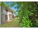 Green backyard featuring a home with neutral siding at 4879 Ardsley Dr, Lithonia, GA 30038