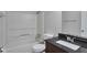 Clean bathroom with granite vanity, bathtub and tiled shower at 4879 Ardsley Dr, Lithonia, GA 30038