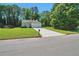 Charming single-Gathering home with a well-manicured lawn and attached two car garage at 4879 Ardsley Dr, Lithonia, GA 30038