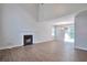 Spacious living room with hardwood floors, a fireplace, and sliding glass doors to the backyard at 4879 Ardsley Dr, Lithonia, GA 30038