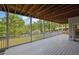 Expansive outdoor deck offers tranquil views of the surrounding landscape at 2216 Trammel Rd, Cumming, GA 30041