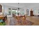 Inviting dining room with a large wood table, perfect for gatherings and Gathering meals at 2216 Trammel Rd, Cumming, GA 30041