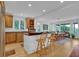 Open-concept kitchen and dining area with wooden cabinets and a functional island space at 2216 Trammel Rd, Cumming, GA 30041