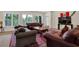 Comfortable seating arrangement with couches and natural light in spacious living room at 2216 Trammel Rd, Cumming, GA 30041