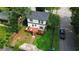 Aerial view of home, with a fenced backyard and spacious deck, in a quiet neighborhood at 2405 Hillside Ave, Decatur, GA 30032