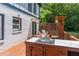 Entertain on the back deck with outdoor kitchen, fire pit, and privacy screen with easy access to the house at 2405 Hillside Ave, Decatur, GA 30032