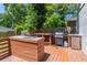 Spacious deck with outdoor kitchen, grill, sink, and refrigerator, perfect for entertaining at 2405 Hillside Ave, Decatur, GA 30032