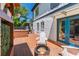 Inviting back deck featuring a wooden hot tub and a modern fire pit with comfortable Adirondack chairs at 2405 Hillside Ave, Decatur, GA 30032