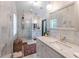 Luxurious bathroom with marble walls, a glass-enclosed shower, and modern fixtures at 2405 Hillside Ave, Decatur, GA 30032