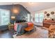Stunning bedroom features a vaulted ceiling, dark accent wall and many windows at 2405 Hillside Ave, Decatur, GA 30032