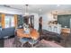 Open concept layout with dining area that flows into kitchen and living room at 2405 Hillside Ave, Decatur, GA 30032