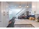 Bright kitchen showcases white cabinetry, marble countertops, and open layout to dining area at 2405 Hillside Ave, Decatur, GA 30032