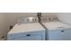 Clean laundry room with side-by-side washer and dryer hookups at 2405 Hillside Ave, Decatur, GA 30032