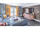 Inviting living room features hardwood floors, stylish decor, and access to the outdoor patio at 2405 Hillside Ave, Decatur, GA 30032