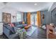 Inviting living room with comfortable seating, stylish decor, and access to the backyard at 2405 Hillside Ave, Decatur, GA 30032