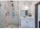 Spacious main bathroom featuring a glass shower with modern hardware, marble tiles and modern sink at 2405 Hillside Ave, Decatur, GA 30032
