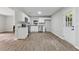 Bright kitchen and dining area with stainless appliances and backyard access at 3919 Valley Brook Rd, Snellville, GA 30039