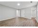 Large main bedroom featuring hardwood floors, neutral walls, and an ensuite bath at 3919 Valley Brook Rd, Snellville, GA 30039
