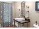 Chic bathroom with modern vanity, stylish mirror, and decorative lighting at 8643 Ellard Dr, Alpharetta, GA 30022