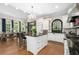 A spacious kitchen with a large island, stainless steel appliances, and a dining area at 8643 Ellard Dr, Alpharetta, GA 30022
