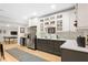 Kitchenette area featuring modern appliances, sleek cabinetry, and an open layout for entertainment at 8643 Ellard Dr, Alpharetta, GA 30022