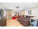 Cozy living room with hardwood floors, modern fixtures, and comfortable seating arrangement at 8643 Ellard Dr, Alpharetta, GA 30022