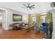 Elegant living room showcasing hardwood floors, fireplace, and neutral wall color at 8643 Ellard Dr, Alpharetta, GA 30022