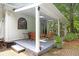 A covered patio with outdoor seating, a ceiling fan, and a grill at 8643 Ellard Dr, Alpharetta, GA 30022