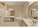Bathroom featuring a soaking tub, double sink vanity, and tile flooring at 1102 Lexington Dr, Roswell, GA 30075