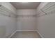 Empty walk-in closet with shelving at 1102 Lexington Dr, Roswell, GA 30075