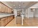 Gourmet kitchen featuring stainless appliances, granite countertops, a breakfast bar and seamless flow into the living space at 1102 Lexington Dr, Roswell, GA 30075