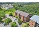 Aerial view of condo buildings and grounds including parking at 3330 Overland Dr, Roswell, GA 30075