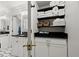 Bathroom featuring a towel rack, shelves for storage and modern cabinets at 3330 Overland Dr, Roswell, GA 30075