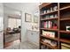Charming bathroom with white cabinets and a built-in bookshelf at 3330 Overland Dr, Roswell, GA 30075