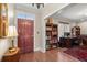 Inviting foyer with hardwood floors and a cozy home office area at 3330 Overland Dr, Roswell, GA 30075