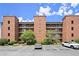 Well-maintained apartment building features balconies and parking, offering convenient urban living at 3330 Overland Dr, Roswell, GA 30075