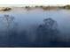 Fog over the tree line at 3330 Overland Dr, Roswell, GA 30075