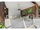 A community gazebo, featuring a ceiling fan and plenty of seating, offers a comfortable spot for relaxation at 3330 Overland Dr, Roswell, GA 30075