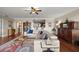 Open-concept living room with hardwood floors and comfortable seating at 3330 Overland Dr, Roswell, GA 30075